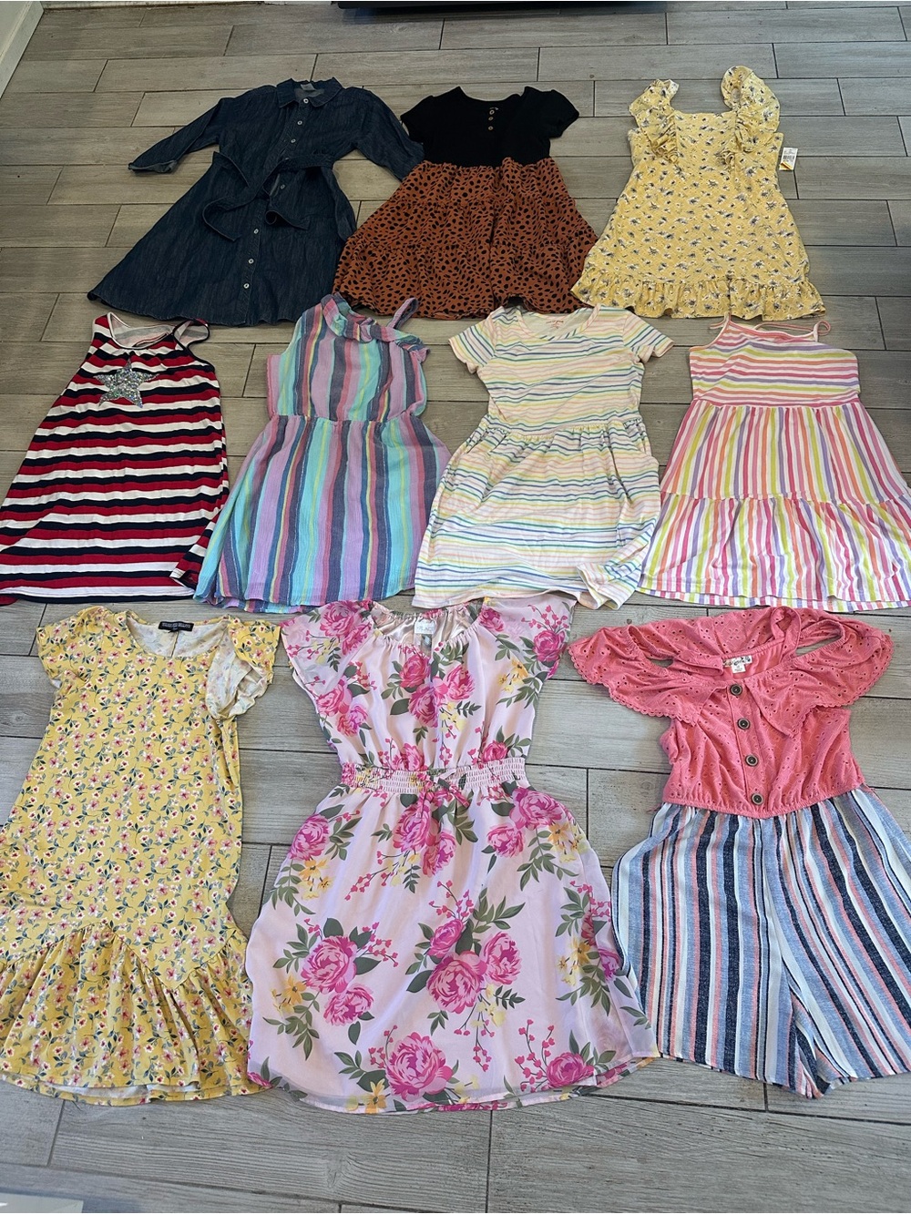 10 girls size 10/12 large dresses and 1 romper